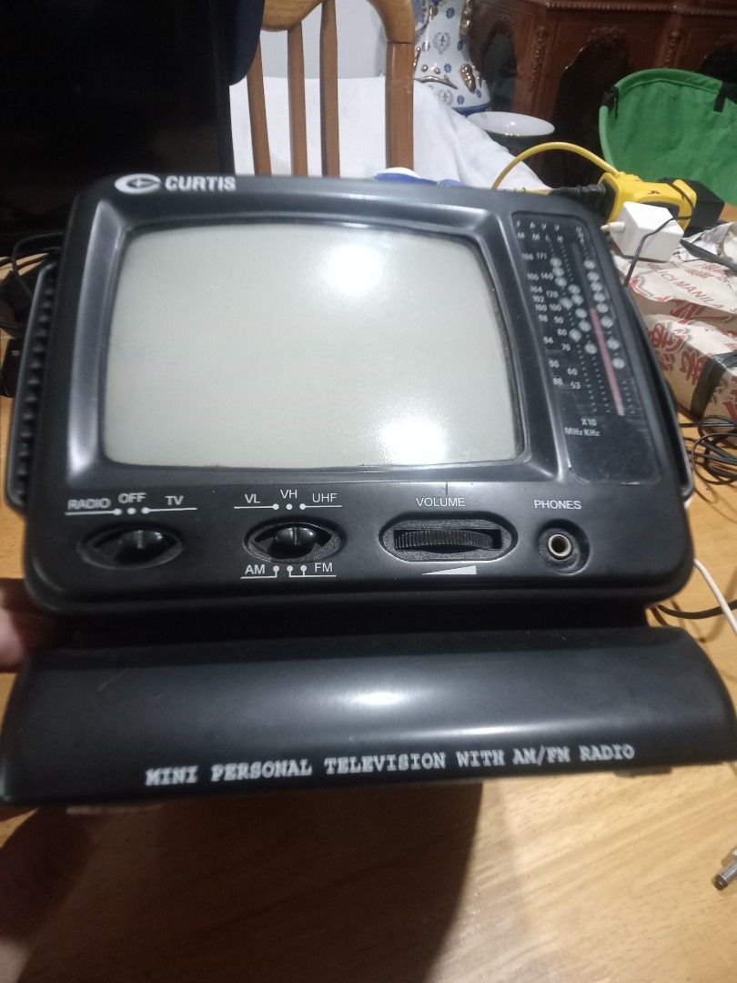 Curtis Mini TV (Category: TV) located in Makati City. Submitted by pardsroman (Listing ID 1442590712, Image 3). Description: - Brand: Curtis - Type: Mini Personal Television - Screen Size: 5" (Black & White) - Features: Built-in AM/FM Radio - Model: RT102 - Color: Black - Power: DC 12V - Condition: full working am/fm Yung tv sound lng, mejo MABAGAL n mag display MOP via BPI or gcash payment first before delivery no return no exchange. shipping at