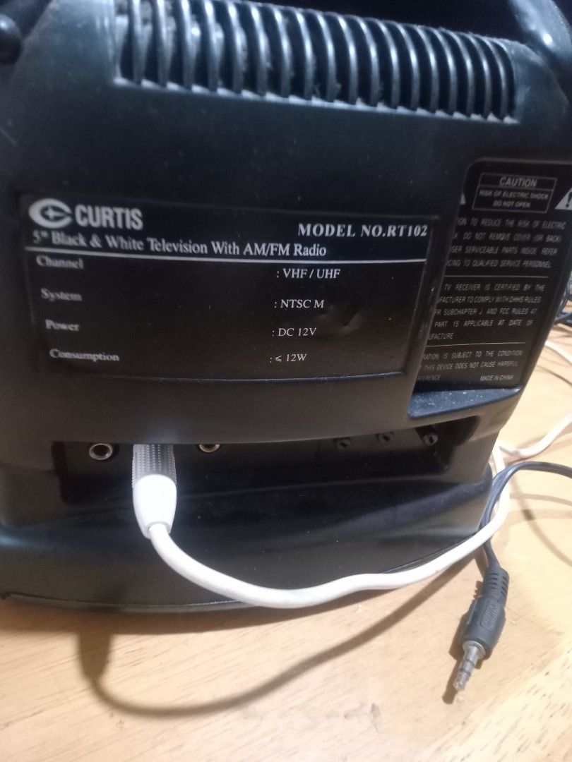 Curtis Mini TV (Category: TV) located in Makati City. Submitted by pardsroman (Listing ID 1442590712, Image 2). Description: - Brand: Curtis - Type: Mini Personal Television - Screen Size: 5" (Black & White) - Features: Built-in AM/FM Radio - Model: RT102 - Color: Black - Power: DC 12V - Condition: full working am/fm Yung tv sound lng, mejo MABAGAL n mag display MOP via BPI or gcash payment first before delivery no return no exchange. shipping at