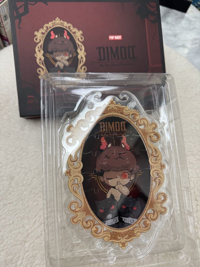 Dimoo - Acrylic Puzzle Frame with freebies (Category: Art & Prints) located in Quezon City. Submitted by kisses14 (Listing ID 1442622401, Image 1). Description: Dimoo - No One’s Gonna Sleep Tonight Series Acrylic Puzzle frame with stand Free Dimoo tattoo stickers and Labubu sticker .