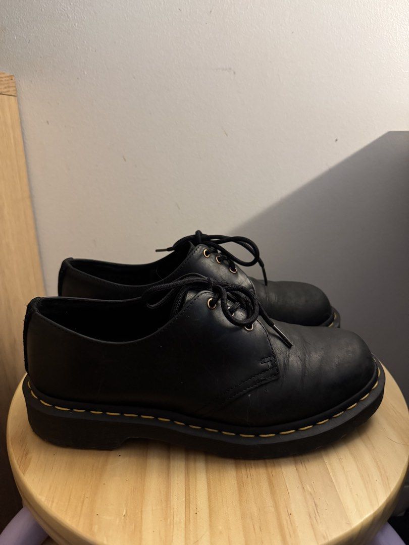 Dr. Martens Black Leather Shoes (Category: Casual Shoes) located in Quezon City. Submitted by nkki11 (Listing ID 1442623900, Image 3). Description: - Classic Dr. Martens 1461 shoes - Black leather, 3-eyelet oxford style - Iconic yellow welt stitching - Comfortable air-cushioned sole - Wardrobe essential, perfect for dressing up or down No box .