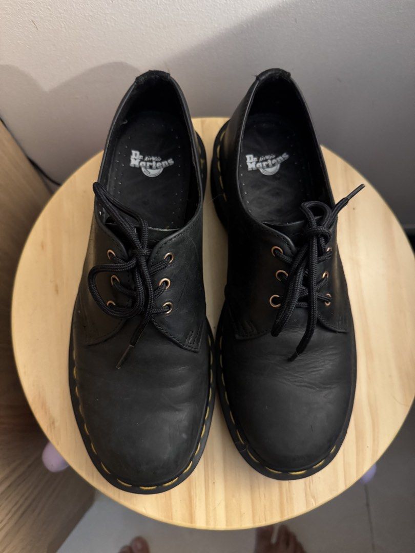 Dr. Martens Black Leather Shoes (Category: Casual Shoes) located in Quezon City. Submitted by nkki11 (Listing ID 1442623900, Image 2). Description: - Classic Dr. Martens 1461 shoes - Black leather, 3-eyelet oxford style - Iconic yellow welt stitching - Comfortable air-cushioned sole - Wardrobe essential, perfect for dressing up or down No box .