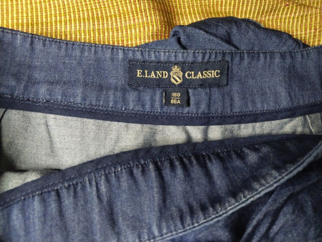 e.land CLASSIC Denim Ruffle Skirt (Category: Skirts) located in Manila. Submitted by b0nniem4rt (Listing ID 1442615740, Image 2). Description: Has a zipper closure..