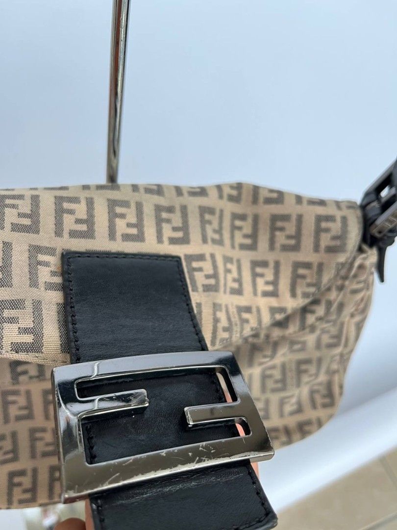 Fendi Zucchino Baguette (Category: Luxury Bags & Wallets) located in Quezon City. Submitted by cornelle_luxuryph (Listing ID 1442694214, Image 2). Description: Fendi Zucchino Baguette Beige Condition: 8.5-9/10 Very Good, minimal signs of use Price: 34,00 pesos only (plus optional legitgrails certificate for 1,300 pesos only) 100% authentic | Money back guarantee.