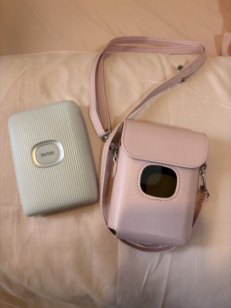 Fujifilm Instax Mini Link 2 Printer with free Pink Case (no box) (Category: Printers, Scanners & Copiers) located in Plaridel. Submitted by rnlvr__ (Listing ID 1442706241, Image 3). Description: - Fujifilm Instax Mini Link 2 printer - Color: White - with FREE pink case - Comes with a cute pink carrying case with strap - Connects wirelessly to your smartphone - Print photos instantly from your phone - Compact and easy to use Pick-Up: Rocka Complex