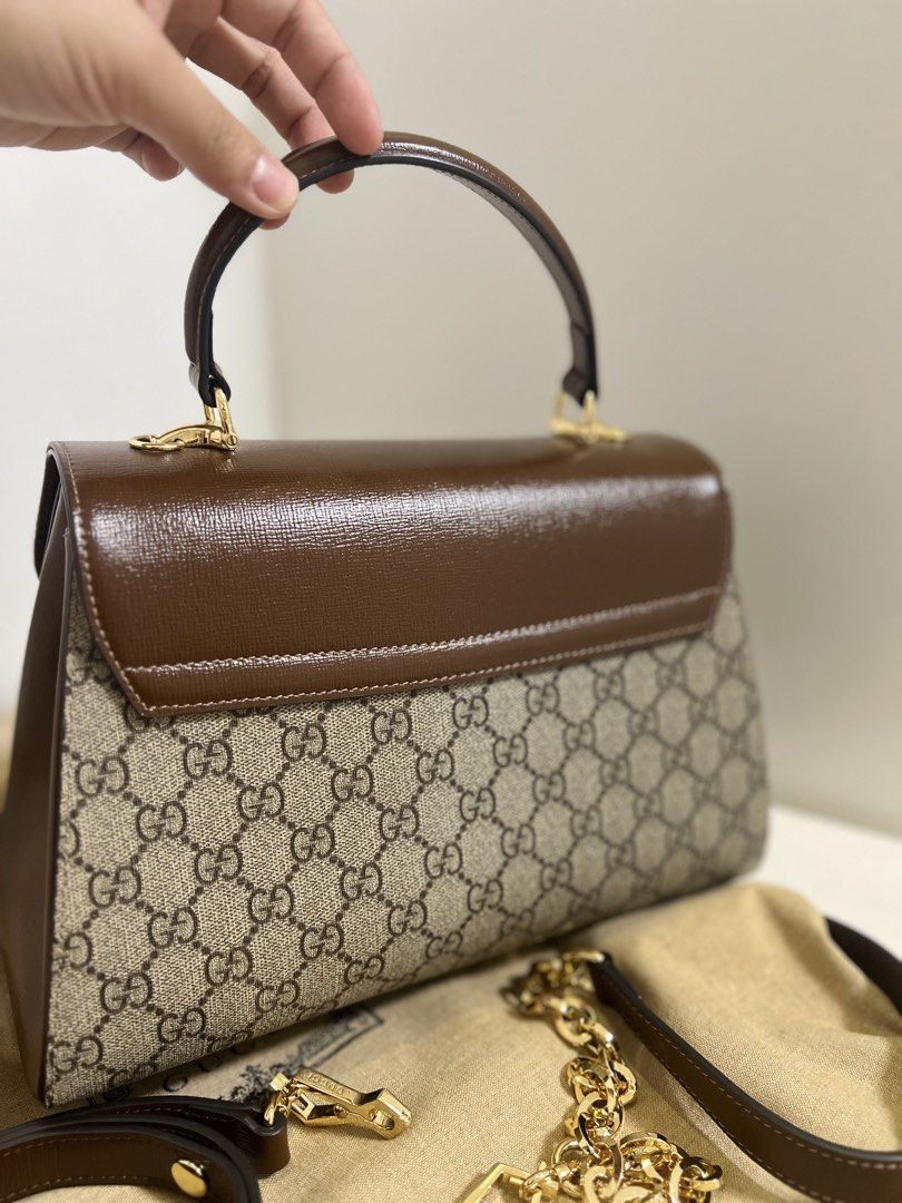 Gucci 1955 Horsebit Top-Handle in Brown (Category: Luxury Bags & Wallets) located in Manila. Submitted by katttdeclutters (Listing ID 1442625740, Image 2). Description: Japan sourced. Negotiable! Dustbag and two straps included. RFS: RUSH migrating • Width 29cm/ 11.4” • Height 20cm/ 7.9” • Depth 13cm/ 5.1”.