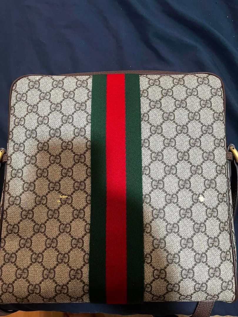 Gucci Ophidia GG Messenger Bag (Category: Luxury Bags & Wallets) located in Mandaluyong City. Submitted by kiko0304 (Listing ID 1442548132, Image 2). Description: Gucci Ophidia GG Messenger Bag in Beige and Ebony GG Supreme Canvas, featuring the iconic red and green Web stripe and antique gold-tone Double G hardware. Condition: • Pre-owned • Flaws are shown in the photos for full transparency • Overall well-maintained Inclusions: • Original Gucci