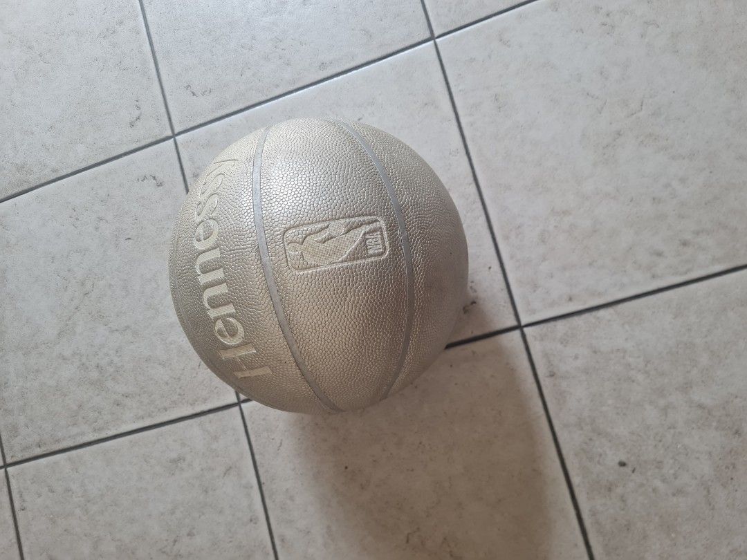 Hennessy NBA Basketball (Category: Racket and Ball Sports) located in Quezon City. Submitted by declutter1990 (Listing ID 1442598104, Image 2). Description: - Official Hennessy basketball featuring the NBA logo. - Textured grip for enhanced control during play. - Versatile: Perfect for both playing on the court or as a display piece. - Shows some signs of use, but remains in good overall condition. - Ideal for collectors and basketball enthusiast