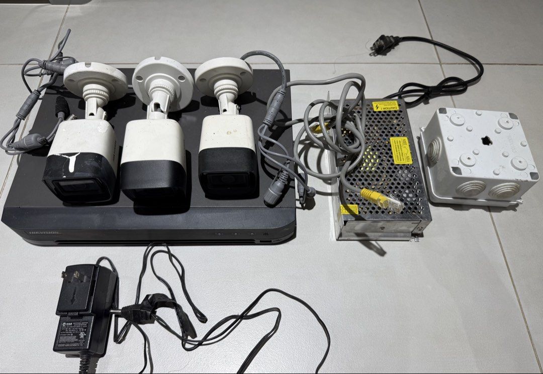 Hikvision 4-Channel DVR Security Camera System with 3 Cameras (Category: Security Systems & CCTV Cameras) located in Manila. Submitted by rmx28 (Listing ID 1442661698, Image 1). Description: - Complete Hikvision CCTV Security System - 1 x Hikvision 4-Channel DVR (Model: IDS-7204HQHI-M1/S) - 3 x Bullet Cameras - Includes DVR Power Supply and Power Adapter - Includes Junction Box - All necessary cables included - Ready for easy setup and installati