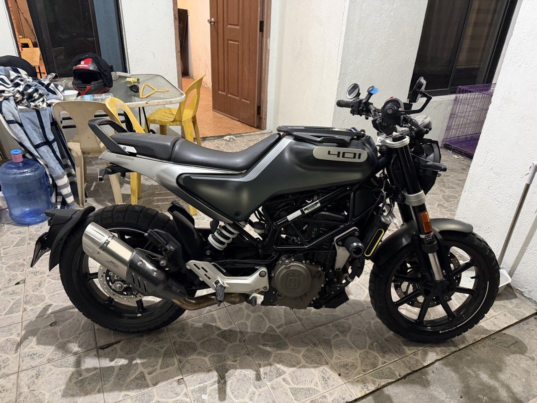 Husqvarna Vitpilen 401 Motorcycle (Category: Motorbikes for Sale) located in Paranaque City. Submitted by draztiknoize (Listing ID 1442713335, Image 3). Description: Husqvarna Vitpilen 401. Dark grey and silver. Aftermarket exhaust installed. Looks clean and well maintained. Ready for a new owner. Great for city riding or weekend adventures..