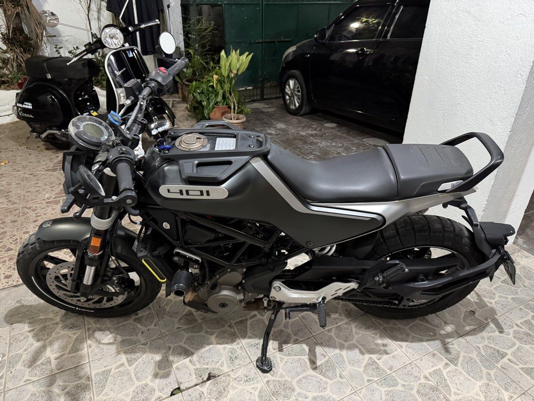 Husqvarna Vitpilen 401 Motorcycle (Category: Motorbikes for Sale) located in Paranaque City. Submitted by draztiknoize (Listing ID 1442713335, Image 1). Description: Husqvarna Vitpilen 401. Dark grey and silver. Aftermarket exhaust installed. Looks clean and well maintained. Ready for a new owner. Great for city riding or weekend adventures..