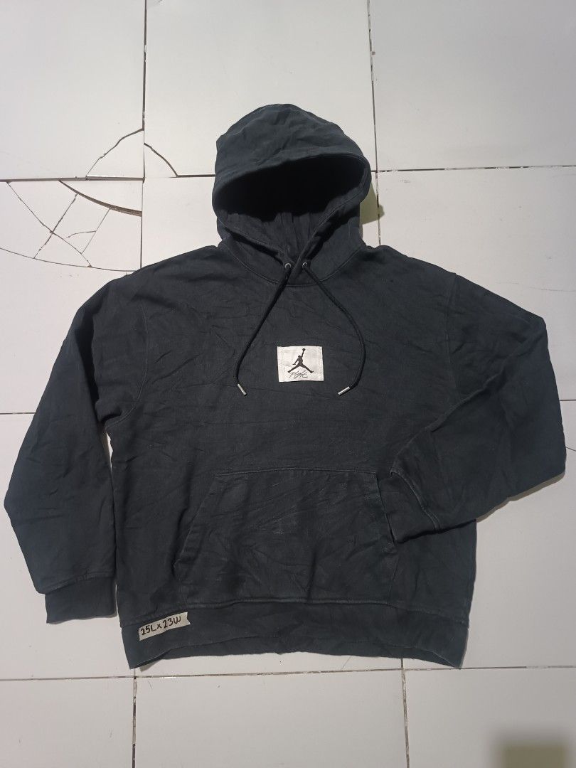 Jordan Flight Black Hoodie (Category: Coats, Jackets and Outerwear) located in Barotac Nuevo. Submitted by gray101 (Listing ID 1442676692, Image 1). Description: - Black Jordan hoodie - Features iconic Jumpman Flight logo on chest - Front kangaroo pocket - Adjustable drawstrings for hood - Made from 100% comfortable cotton - Ideal for everyday casual wear - Tag indicates 'Made in China'.