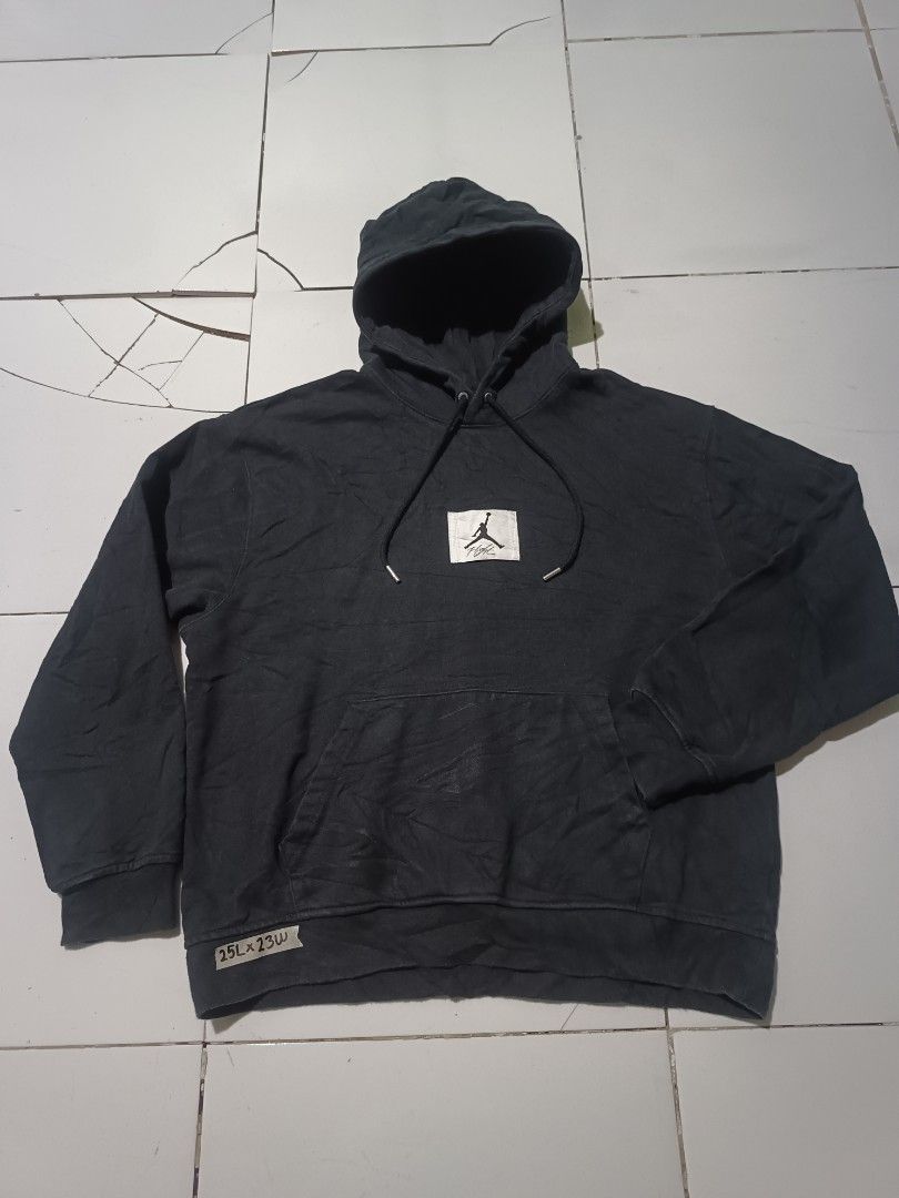 Jordan Flight Black Hoodie (Category: Coats, Jackets and Outerwear) located in Barotac Nuevo. Submitted by gray101 (Listing ID 1442676692, Image 2). Description: - Black Jordan hoodie - Features iconic Jumpman Flight logo on chest - Front kangaroo pocket - Adjustable drawstrings for hood - Made from 100% comfortable cotton - Ideal for everyday casual wear - Tag indicates 'Made in China'.