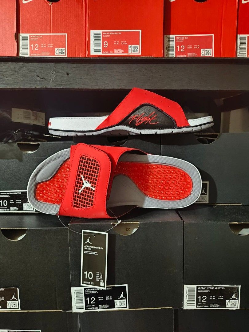 Jordan Flight Red/Black Slides Sandals (Category: Slippers & Slides) located in Manila. Submitted by basiclang (Listing ID 1442696704, Image 1). Description: - Jordan Flight Slides - Color: Red and Black - Size: 10 - Features: Textured footbed for grip, - durable sole with good tread for traction - Ideal for: Casual wear, post-sports recovery - Condition: Brand new with original tags - 3395 size 8,9,10,11.