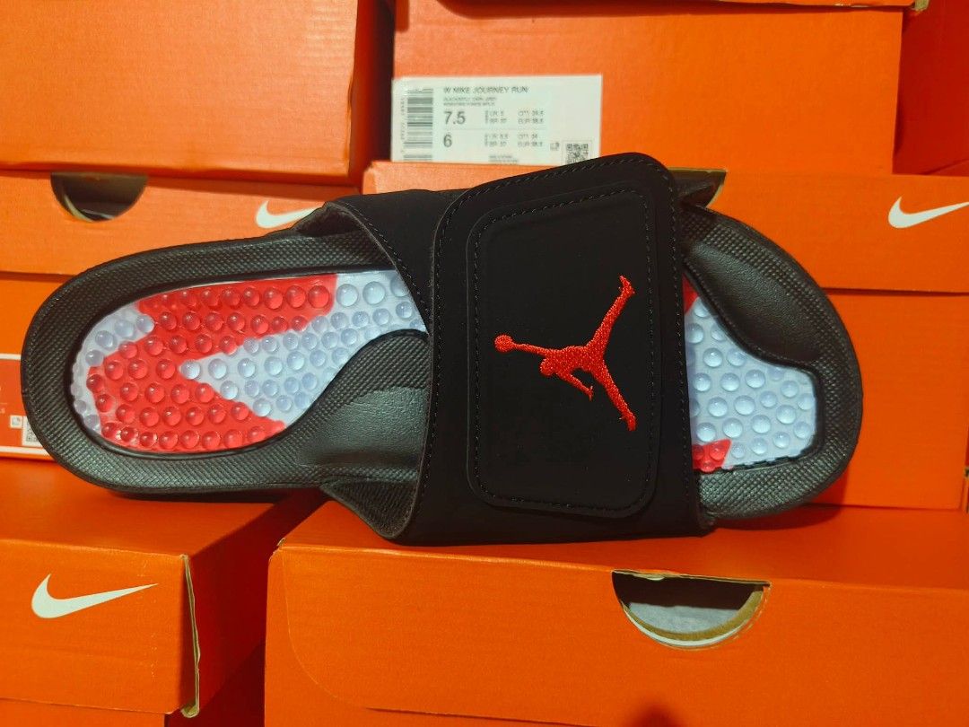 Jordan Slides Black Red Jumpman (Category: Slippers & Slides) located in Manila. Submitted by basiclang (Listing ID 1442696889, Image 3). Description: - Black Jordan slides - Red Jumpman logo - Adjustable strap for a secure fit - Textured sole for enhanced grip - Comfortable for everyday wear - Comes with original box size 10,11,12 2895 only.