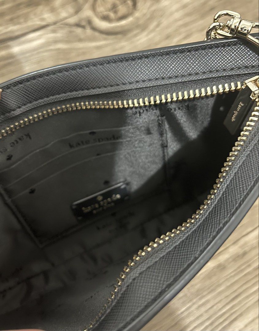 Kate Spade Black Leather Chain Shoulder Bag (Category: Luxury Bags & Wallets) located in Manila. Submitted by raawrnicss (Listing ID 1442706561, Image 2). Description: ORIGINAL Bought for 4k Used once only NO ISSUES 💯 Payment first Can do meet up in SM Megamall Delivery: Lalamove.