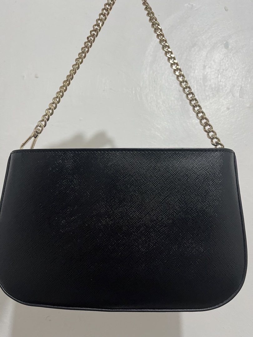 Kate Spade Black Leather Chain Shoulder Bag (Category: Luxury Bags & Wallets) located in Manila. Submitted by raawrnicss (Listing ID 1442706561, Image 3). Description: ORIGINAL Bought for 4k Used once only NO ISSUES 💯 Payment first Can do meet up in SM Megamall Delivery: Lalamove.