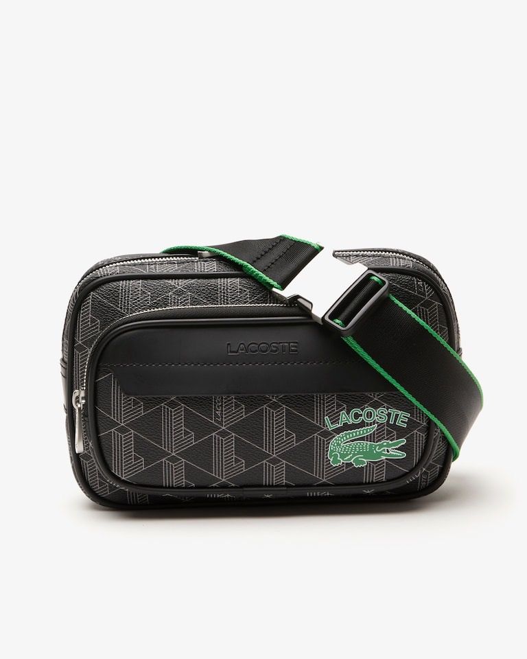 Lacoste Monogram Crossbody Bag Black Green Strap (Category: Cross-body Bags) located in Caloocan City. Submitted by krisellean89709 (Listing ID 1442556000, Image 1). Description: - Authentic Lacoste crossbody bag - Color: Black with white geometric monogram print - Adjustable strap with green trim and silver buckle - Multiple zippered compartments for organization - Ideal for everyday use or travel - Brand new with tags.