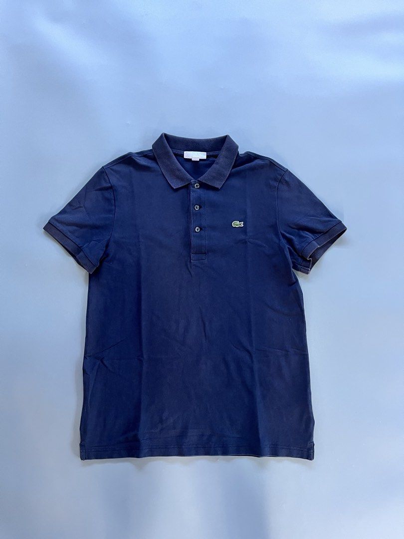Lacoste polo shirt navy blue (Category: Tshirts & Polo Shirts ) located in Camalig. Submitted by danllagass (Listing ID 1442550954, Image 2). Description: Good condition Size 3 on tag Fit to small 19/27 dimension Minimal colar Authentic and legit 9/10 color rate.