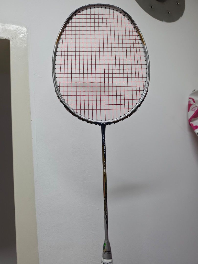 Li Ning Racket (Category: Racket & Ball Sports) located in Singapore. Submitted by starkly.co (Listing ID 1442568021, Image 1). Description: It features 3D Calibar Technology, a geometric frame design intended to reduce air resistance. Used in competitions..