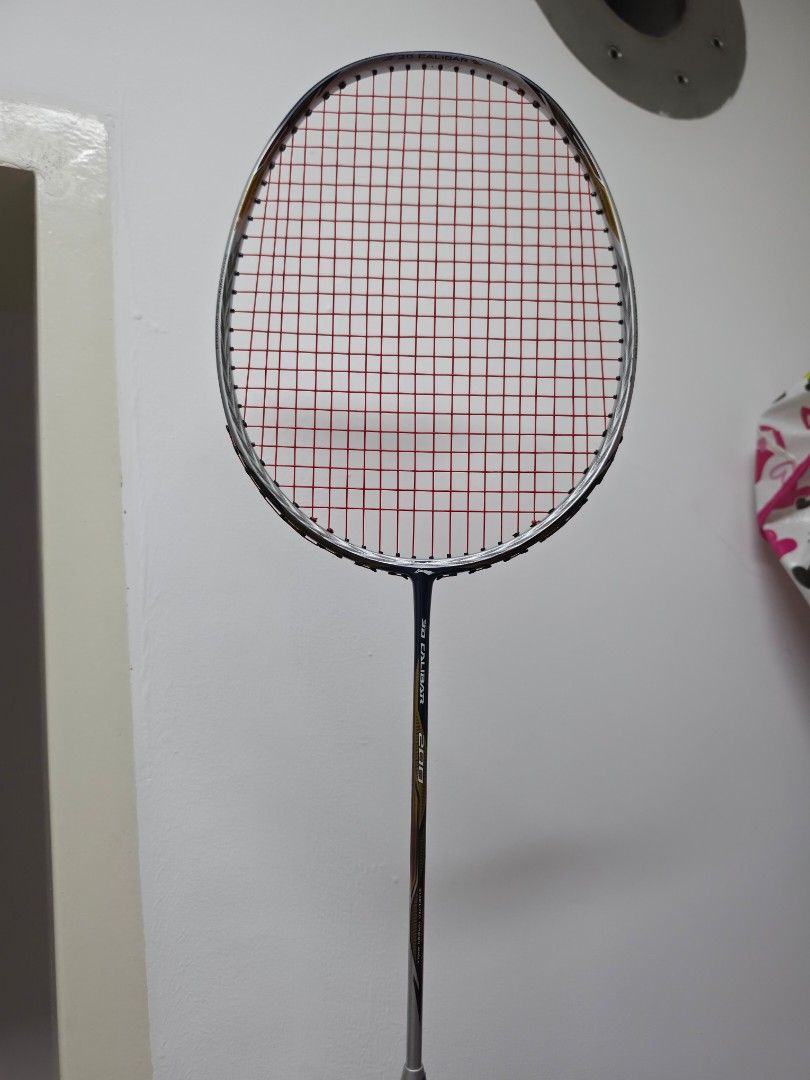 Li Ning Racket (Category: Racket & Ball Sports) located in Singapore. Submitted by starkly.co (Listing ID 1442568021, Image 2). Description: It features 3D Calibar Technology, a geometric frame design intended to reduce air resistance. Used in competitions..