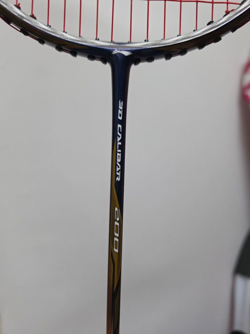 Li Ning Racket (Category: Racket & Ball Sports) located in Singapore. Submitted by starkly.co (Listing ID 1442568021, Image 3). Description: It features 3D Calibar Technology, a geometric frame design intended to reduce air resistance. Used in competitions..