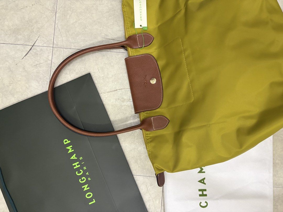 Longchamp Le pliage tote in small and large (Category: Luxury Bags & Wallets) located in Manila. Submitted by pursonalshopper (Listing ID 1442558557, Image 2). Description: .