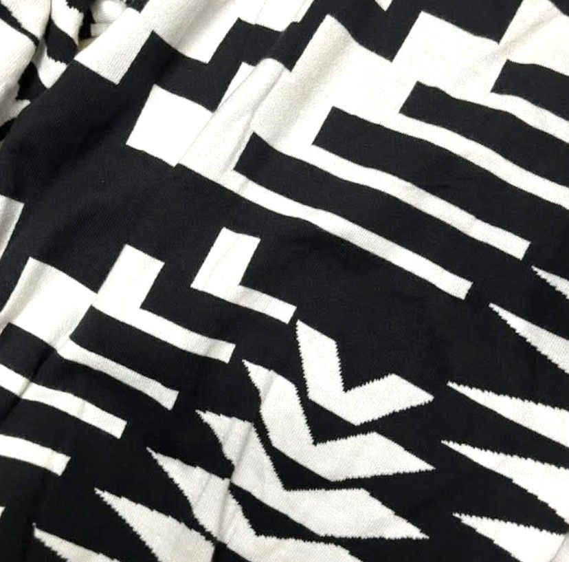 LOUIS VUITTON MONOGRAM KNIT SWEATER BLACK WHITE (Category: Luxury Apparel) located in Rizal. Submitted by rcthriftcollection (Listing ID 1442699496, Image 3). Description: LOUIS VUITTON MONOGRAM KNIT SWEATER BLACK WHITE Width 23 Length 28 Best fit Large Excellent to Asnew DM to purchase 📥📥📥 Location: MONTALBAN, RODRIGUEZ, RIZAL .