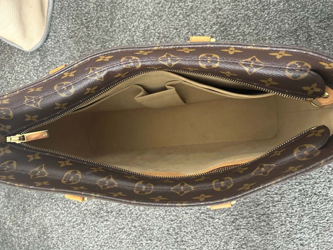 Louis Vuitton Monogram Tote Bag (Category: Luxury Bags & Wallets) located in Quezon City. Submitted by zivimine (Listing ID 1442596090, Image 3). Description: - Classic Louis Vuitton tote bag in iconic Monogram canvas. - Genuine leather handles and trim for a luxurious feel. - Secure zipper closure to keep your belongings safe. - Interior features one zippered pocket and two slip pockets for organization. - Ideal for everyday use, combining style