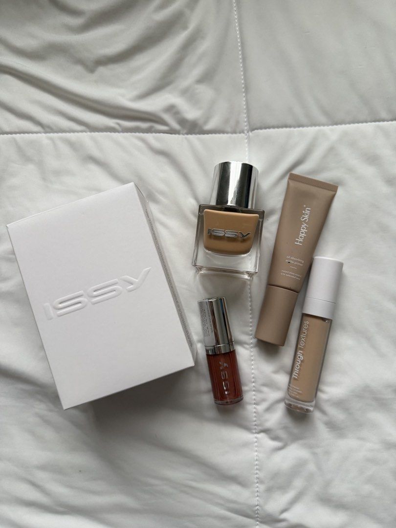 Makeup bundle (Category: Makeup) located in Cabuyao City. Submitted by sweethriftph (Listing ID 1442599342, Image 2). Description: These are still like new (i have a LOT of makeup na) •ISSY foundation shade NM3.5 (Medium Tan Neutral) - bought the wrong shade • Happy skin primer • ISSY hydragloss shade Off-duty • Naturale concealer shade “ABEL”.