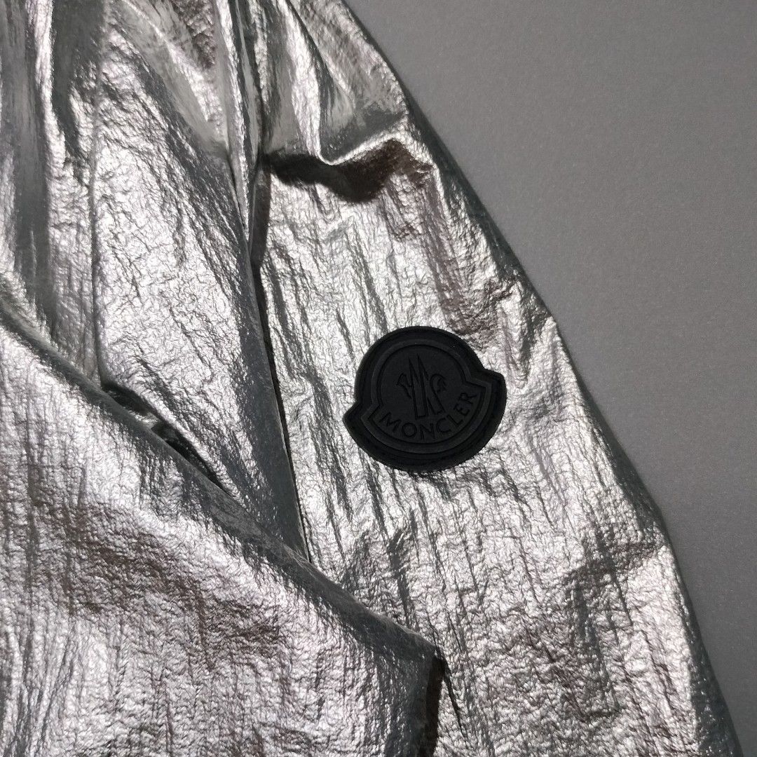 Moncler Mikael Metallic Hooded Lightweight Jacket -- (Category: Coats, Jackets and Outerwear) located in Las Pinas. Submitted by r4nd0m.thr1ft (Listing ID 1442680168, Image 3). Description: actual dimes -- 21.5 width x 25.5 length In very good condition, no major issue Water repellant DM to purchase 📩 .