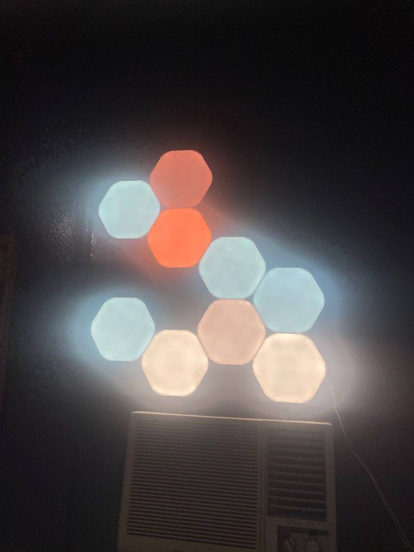 Nanoleaf Hexagon 9-Pack Starter Kit (Category: Lighting) located in Imus. Submitted by pguecs (Listing ID 1442572288, Image 2). Description: Selling my Nanoleaf Hexagon 9 Pack Starter Kit. Originally bought from DataBlitz for 11k+, selling for only 8500, slightly negotiable. Had it on my wall but I repainted my room, had no time to put it back on. Been in storage ever since. No more box, just the lights, connectors and cord. You will have to buy 