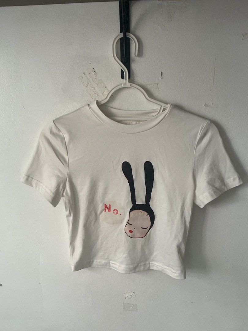 Nara Yoshitomo Graphic Cropped Shirt (Category: Blouses) located in Binan City. Submitted by glitteryeyeshadow (Listing ID 1442556834, Image 1). Description: size xsmall but can fit up to small since material is stretchy! never used I can give a discount if you get another item from my shop!.