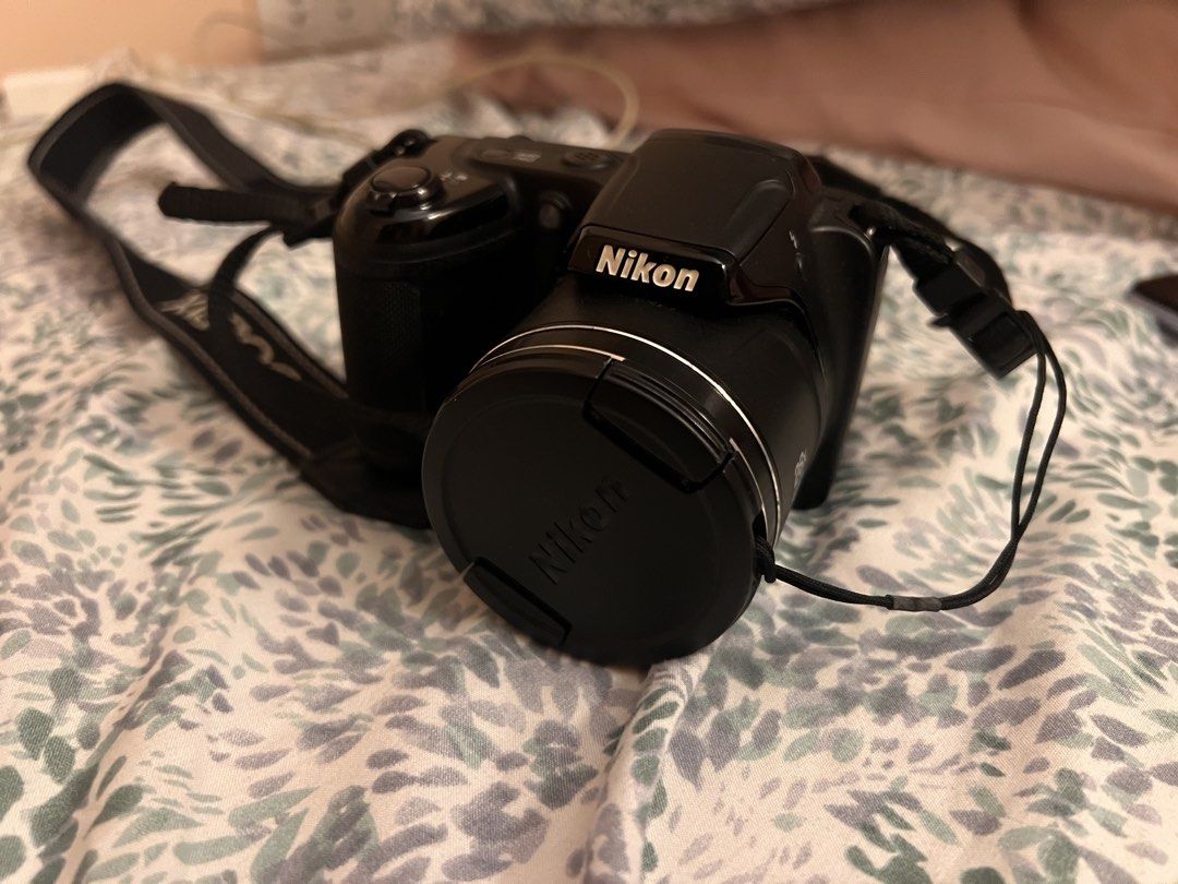 Nikon Coolpix L340 Digital Camera with Strap (Category: Cameras) located in Santa Rosa. Submitted by gianneapple (Listing ID 1442703182, Image 2). Description: - Nikon Coolpix L340 digital camera - Ideal for everyday photography - Simple and easy to operate - Includes original strap - Lens cap included - Ready for its new owner -Double A batteries not included.