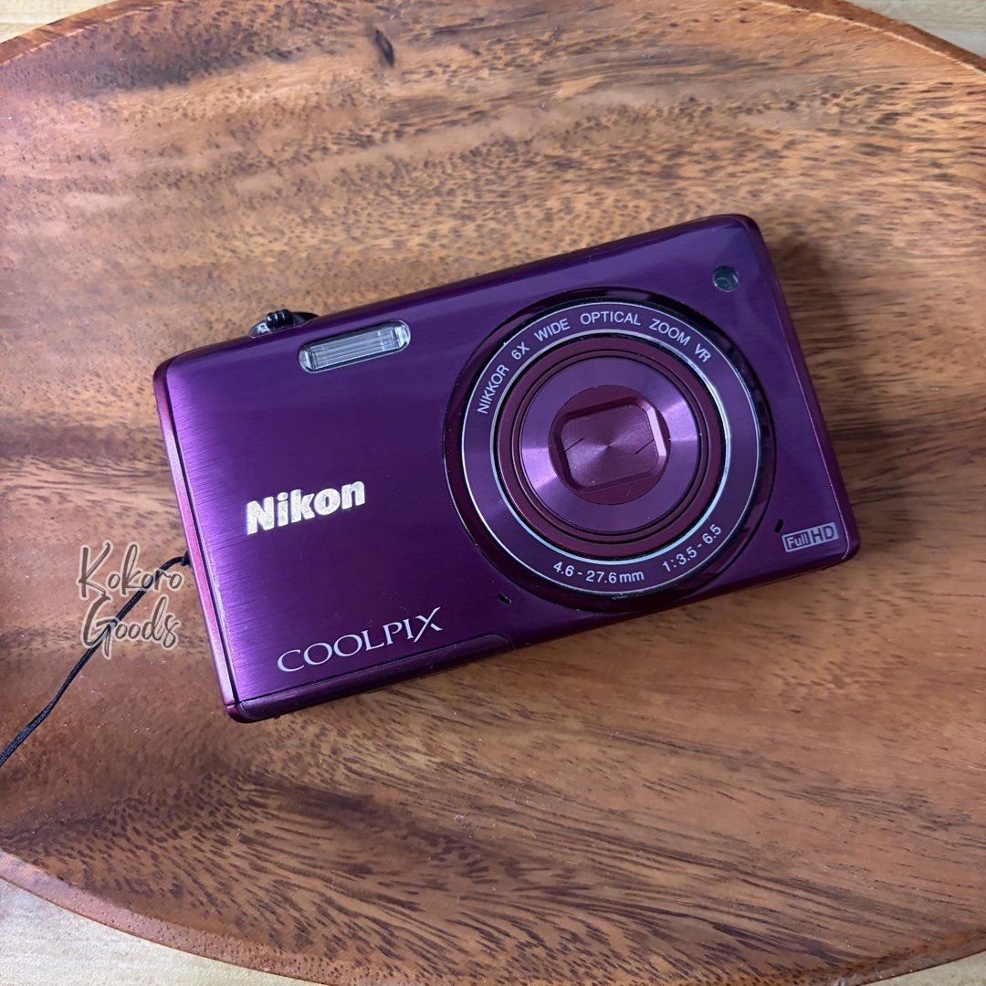 Nikon Coolpix S5200 (WIFI) Digital Camera Digicam (Category: Cameras) located in Caloocan City. Submitted by lynaldeax (Listing ID 1442551935, Image 1). Description: Nikon Coolpix S5200 Digital Camera Purple RARE UNIT All functions working All buttons working Screen Ok Zoom in/out Ok No issue Ready to use! Mirrorless levelz ang camera quality! Marketprice: 19-23k *port cover - replaced with leather sticker Features: * 16.0 MP Backside-Illuminated