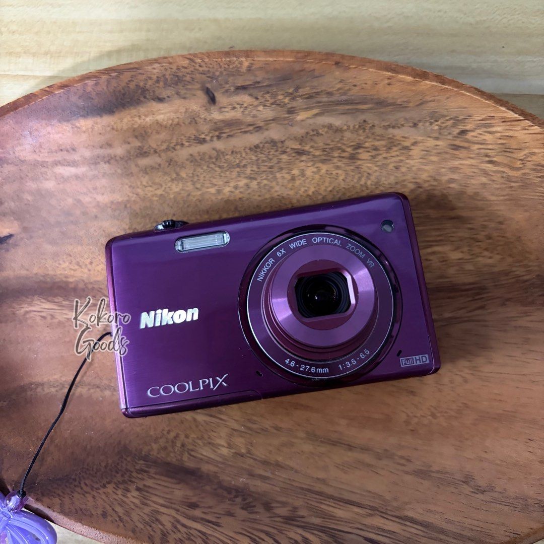 Nikon Coolpix S5200 (WIFI) Digital Camera Digicam (Category: Cameras) located in Caloocan City. Submitted by lynaldeax (Listing ID 1442551935, Image 3). Description: Nikon Coolpix S5200 Digital Camera Purple RARE UNIT All functions working All buttons working Screen Ok Zoom in/out Ok No issue Ready to use! Mirrorless levelz ang camera quality! Marketprice: 19-23k *port cover - replaced with leather sticker Features: * 16.0 MP Backside-Illuminated