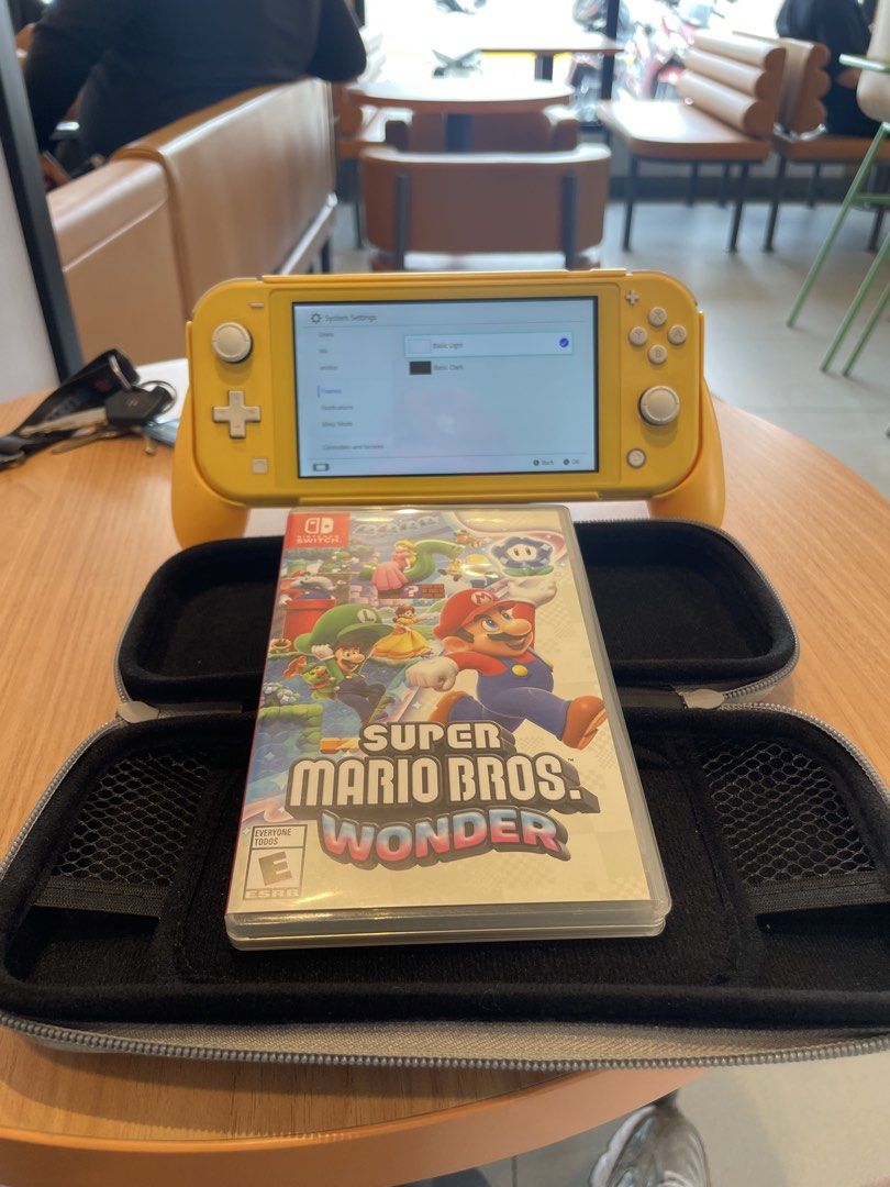 Nintendo switch lite (Category: Nintendo) located in Manila. Submitted by juszt (Listing ID 1442590862, Image 1). Description: Nintendo switch lite Unit Grip Carrying case Mario bros wonder with case No charger and box 6k firm North caloocan/ fairview/ novaliches.