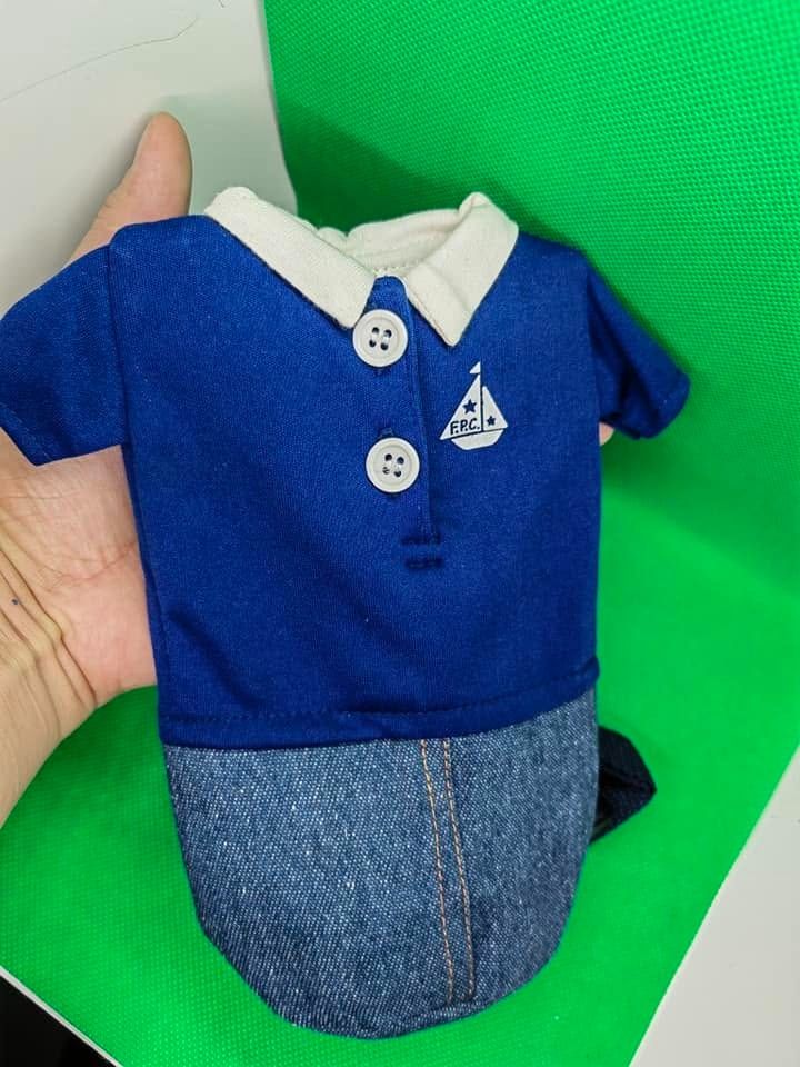 Novelty plastic bottle cover (Category: Other Kitchenware & Tableware) located in Cebu City. Submitted by dudes_villanueva (Listing ID 1442649711, Image 1). Description: Novelty plastic bottle cover 📌 designed to look like a small collared shirt. 📌 It slips over standard 500ml beverage bottles to insulate them, absorb condensation, and decorate the bottle. 📌Comes with a convenient shoulder strap..