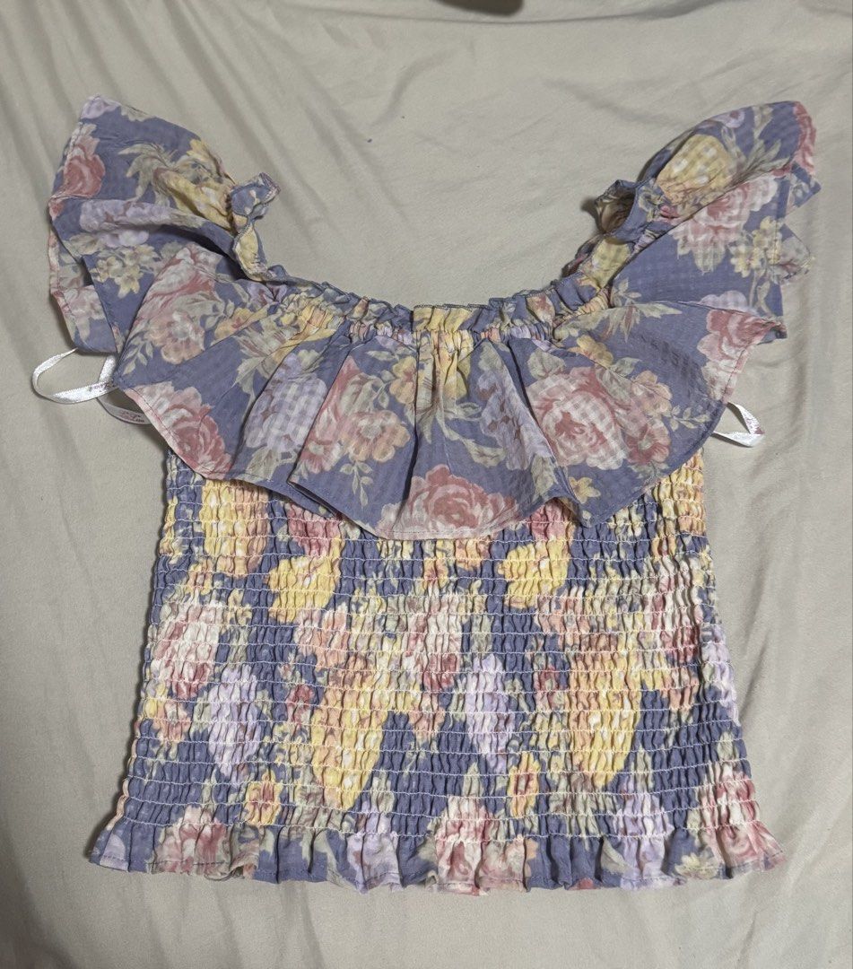 Off-Shoulder Smocked Floral Puff Sleeve Top (Category: Blouses) located in Cebu City. Submitted by shushcart (Listing ID 1442647314, Image 2). Description: like new. used once dm for when worn.