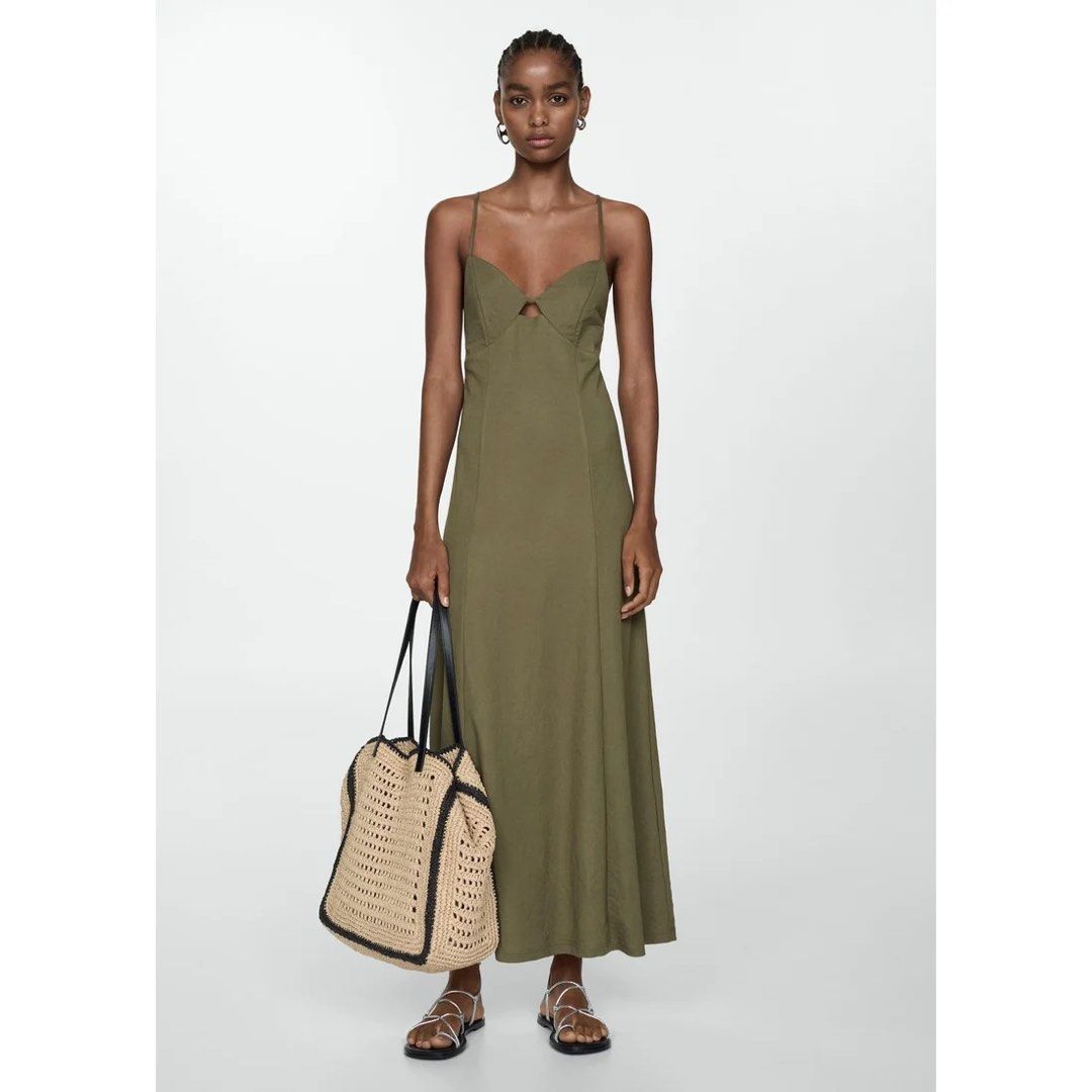 Mango Olive Green / Khaki Dress (Category: Dresses) located in Rizal. Submitted by okcath (Listing ID 1442617935, Image 1). Description: - Olive green dress - Flattering cut-out detail at the bust - Ideal for events like weddings, beach trips or just a casual day outside - Comfy and high quality material - Used once for my birthday dinner.