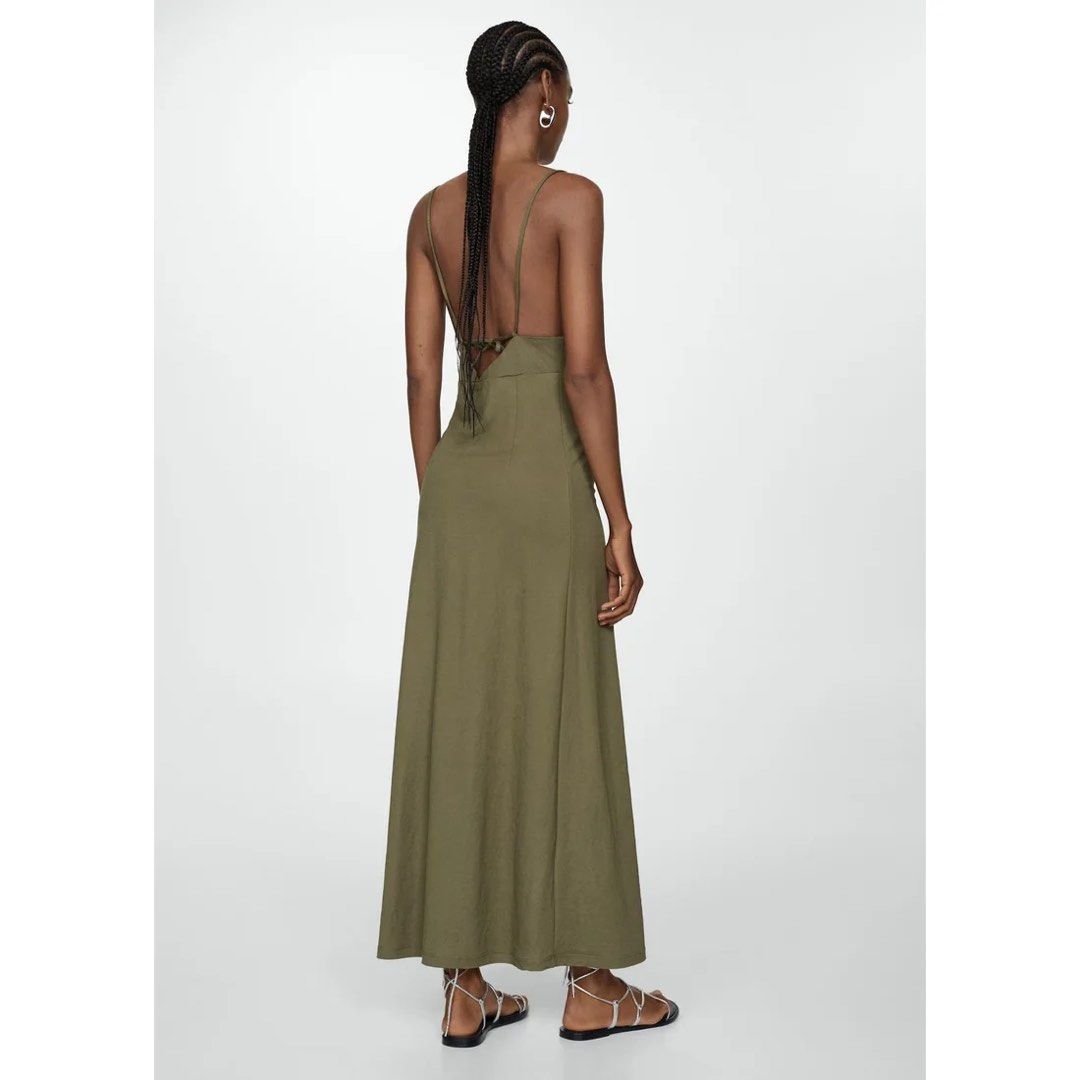 Mango Olive Green / Khaki Dress (Category: Dresses) located in Rizal. Submitted by okcath (Listing ID 1442617935, Image 3). Description: - Olive green dress - Flattering cut-out detail at the bust - Ideal for events like weddings, beach trips or just a casual day outside - Comfy and high quality material - Used once for my birthday dinner.