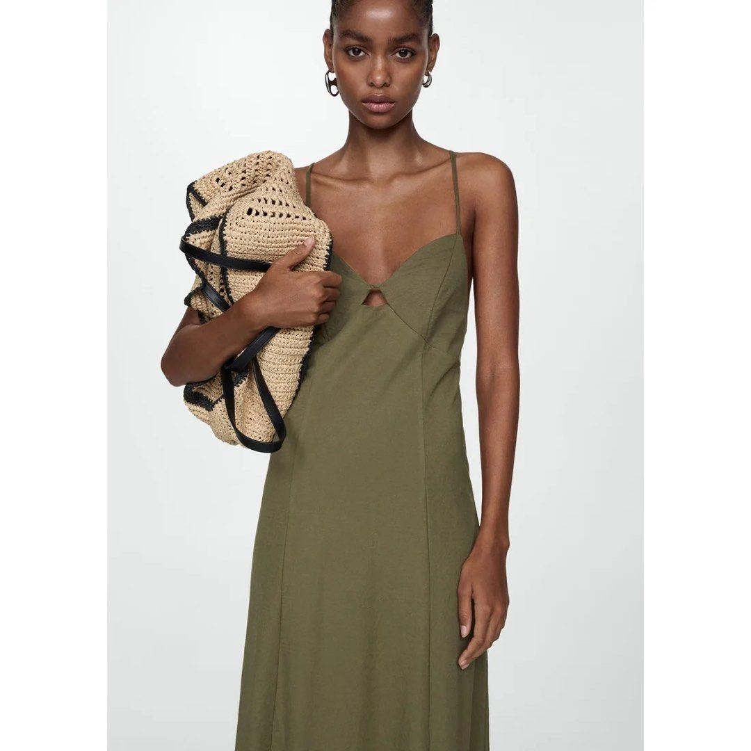 Mango Olive Green / Khaki Dress (Category: Dresses) located in Rizal. Submitted by okcath (Listing ID 1442617935, Image 2). Description: - Olive green dress - Flattering cut-out detail at the bust - Ideal for events like weddings, beach trips or just a casual day outside - Comfy and high quality material - Used once for my birthday dinner.