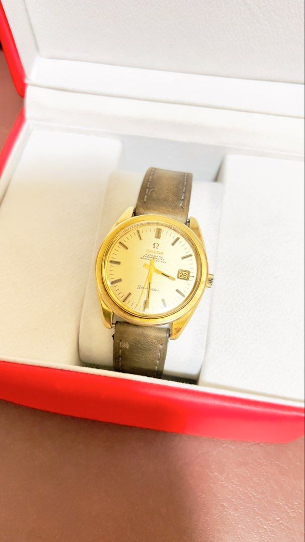 Omega Seamaster Gold Watch with presentation box (Category: Luxury Watches) located in Paranaque City. Submitted by vanillag0815 (Listing ID 1442633494, Image 2). Description: - Authentic 1960’s -70’s Omega Seamaster timepiece - Elegant gold tone case and dial - Date window at 3 o'clock - Comes with Omega presentation box, outer box, and booklet - Classic leather butterfly strap - 36mm - caliber 564 -original Omega Crown -Champagne Dial pls set y