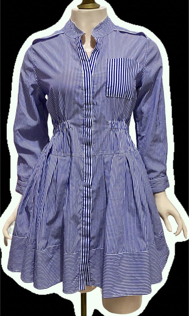 Ovia blue stripe Dress (Category: Dresses) located in Binan City. Submitted by myutopia28 (Listing ID 1442624613, Image 1). Description: Size small to medium Model: OviaPattern: Blue and white vertical pinstripesDesign Features:Classic point collar with a full button-down front placketFitted, gathered elasticized waist panel for structured tailoringAsymmetric stripe orientation on the chest pocket and bottom skirt trimLong sleeves with structured