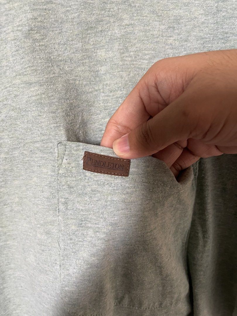 Pendleton Pocket T-Shirt - Light green (Category: Tshirts & Polo Shirts ) located in Tarlac. Submitted by supremo.0 (Listing ID 1442562653, Image 3). Description: - Pendleton light green pocket tee - Made from soft, comfortable fabric - Features a small brown leather tag on the chest pocket - Ideal for casual wear - Versatile and easy to pair with any outfit.