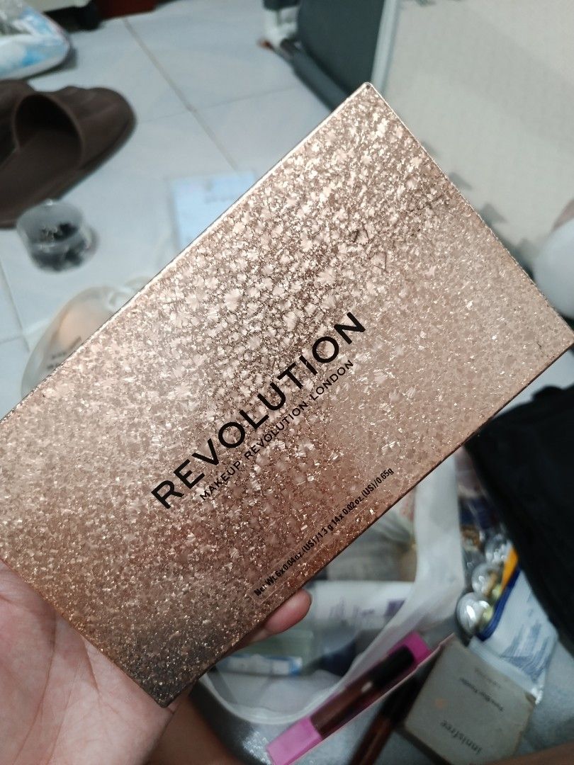 Revolution Makeup London Eyeshadow Palette (Category: Makeup) located in Dasmarinas. Submitted by gofredoang38096 (Listing ID 1442566044, Image 2). Description: - Revolution eyeshadow palette - Features a mix of shimmery and matte shades - Some shades have been lightly swatched, but most product remains - Versatile for both everyday and glam looks - Selling as it's not frequently used.