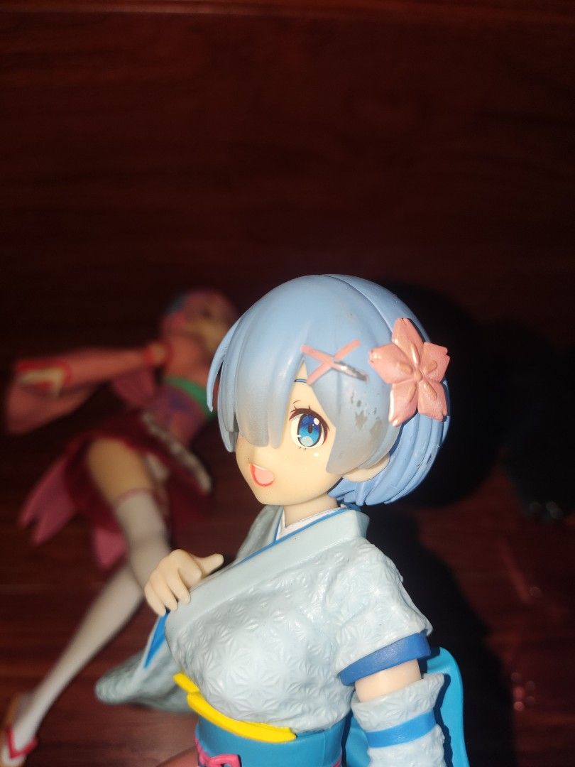 Re:Zero Ram & Rem Figures with Cherry Blossom Stands (Category: Figurines & Statues) located in General Mariano Alvarez. Submitted by zen_006 (Listing ID 1442602226, Image 2). Description: - Wafuu Maid Set of Ram and Rem figures from Re:Zero - Includes special cherry blossom display stands - Ideal for fans of the Re:Zero series - Sold as a complete set - Please expect minor scratch or paint chip -Loose figure only.