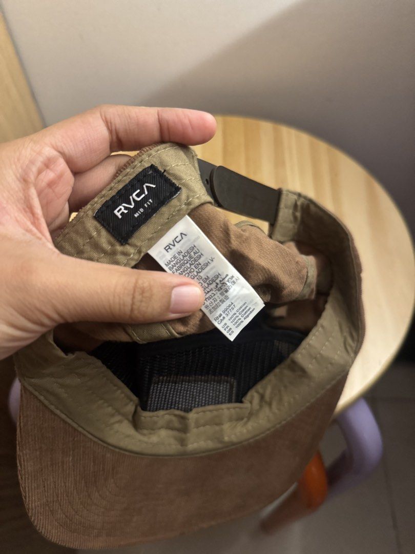 RVCA Corduroy Mid Fit Cap Brown (Category: Caps & Hats) located in Quezon City. Submitted by nkki11 (Listing ID 1442612683, Image 2). Description: - Brand: RVCA - Color: Brown - Material: 100% Cotton - Style: Mid Fit Cap - Features: Adjustable strap for a custom fit - Perfect for: Everyday wear, classic style.