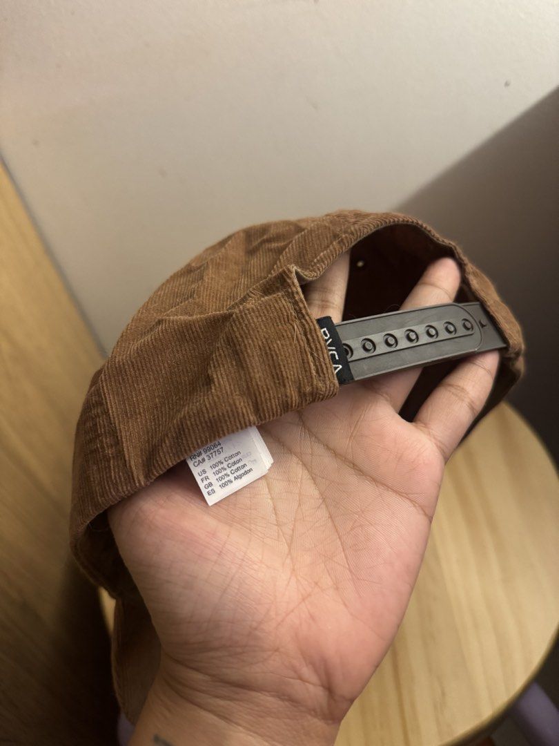 RVCA Corduroy Mid Fit Cap Brown (Category: Caps & Hats) located in Quezon City. Submitted by nkki11 (Listing ID 1442612683, Image 3). Description: - Brand: RVCA - Color: Brown - Material: 100% Cotton - Style: Mid Fit Cap - Features: Adjustable strap for a custom fit - Perfect for: Everyday wear, classic style.