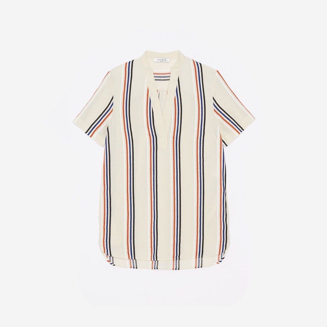 Sandro Paris Striped Tunic Top (Category: Others Tops) located in Tanza. Submitted by deeclutterer (Listing ID 1442687089, Image 2). Description: - Sandro Paris cream tunic top - Features vertical stripes in navy, red, and black - V-neck with a small collar detail - Short sleeves - Versatile for pairing with shorts or leggings - Comfortable and stylish for everyday wear Orígín@l SANDRO Paris Cotton/linen Small (can be worn as shirt dress) ₱650.