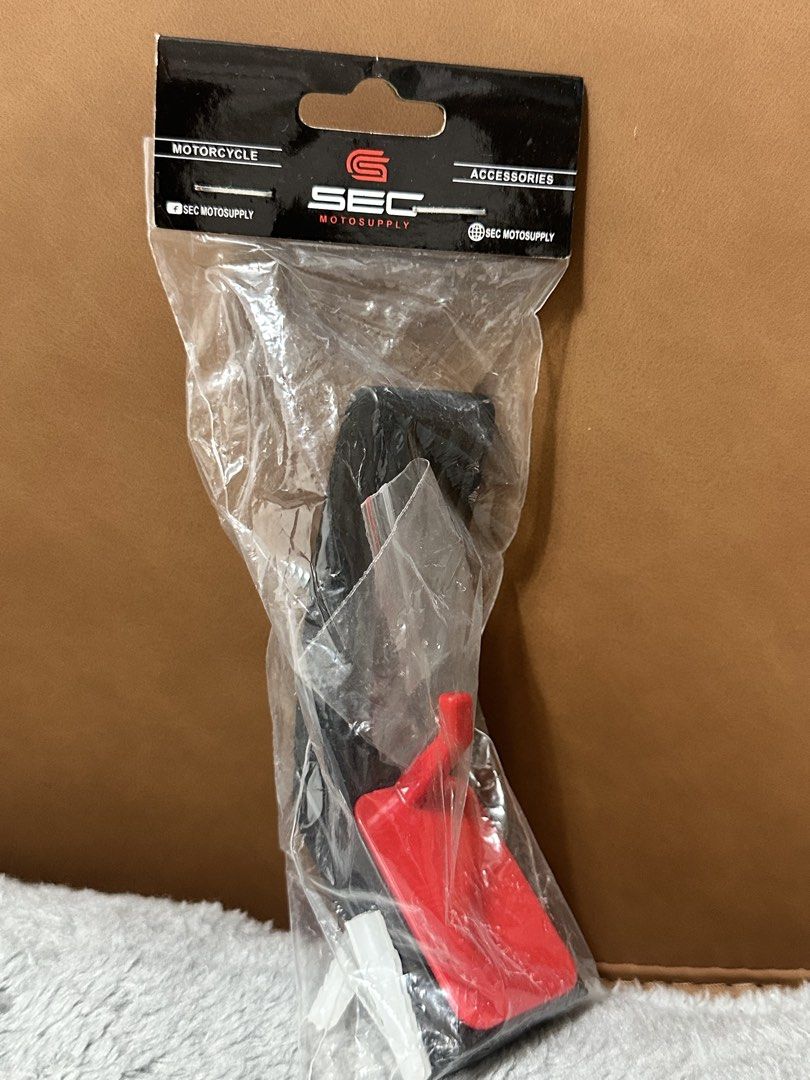 SEC Helmet Wall Hook Holder (Category: Helmets and other Riding Gears) located in Las Pinas. Submitted by csierra (Listing ID 1442716024, Image 1). Description: - SEC Motosupply motorcycle accessories - Brand new, in original packaging - Includes red and white plastic parts - Ideal for your motorcycle needs.